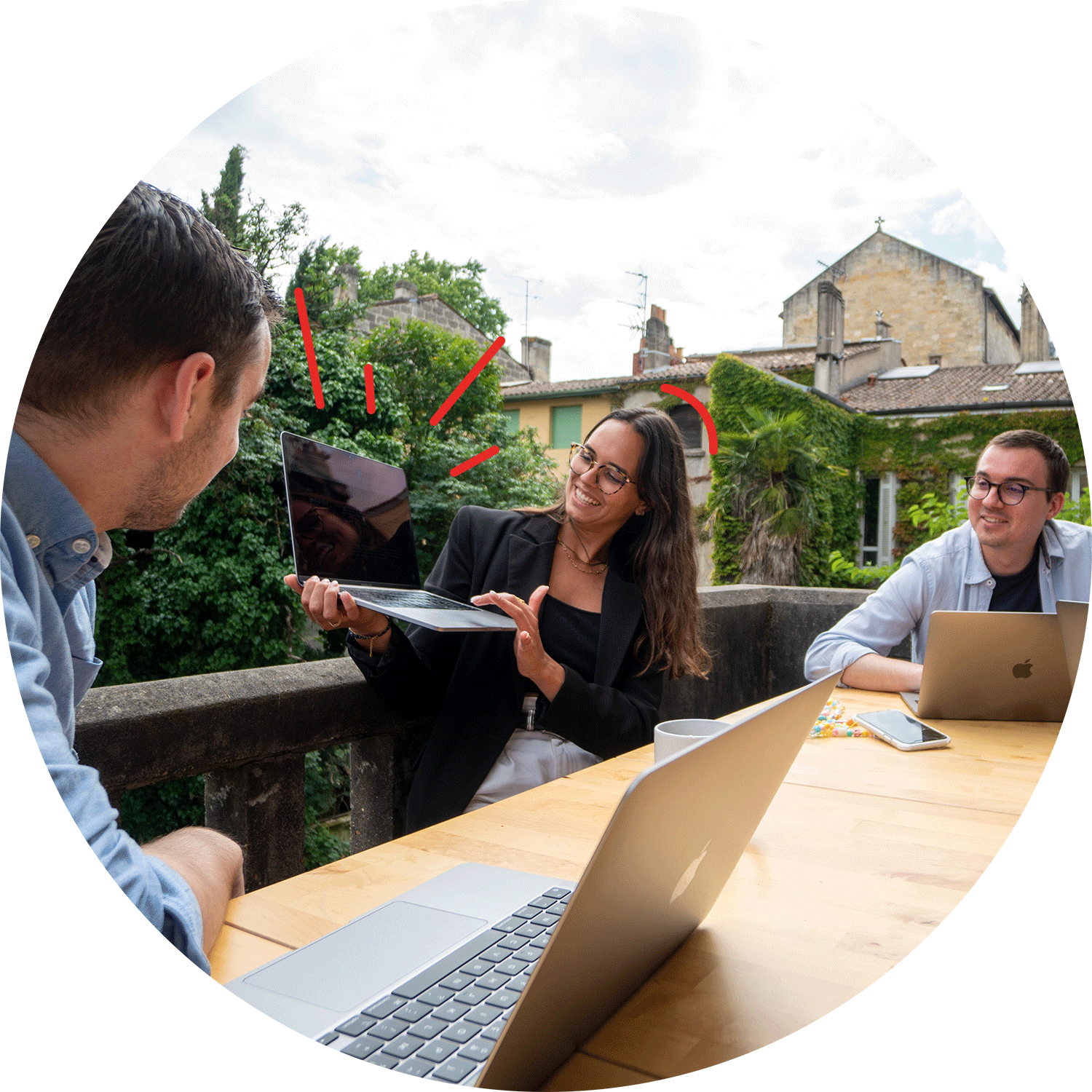 Three people working outdoors